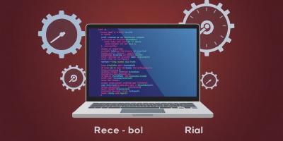 Laptop with code, gears, and speed indicators for Rails.